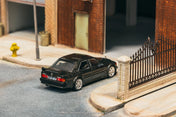 TW 1:64 Mercedes-Benz 190 E 2.5.16 EVO 1 Blue-Black metallic T64G057-BK