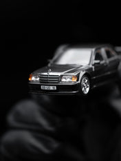 TW 1:64 Mercedes-Benz 190 E 2.5.16 EVO 1 Blue-Black metallic T64G057-BK