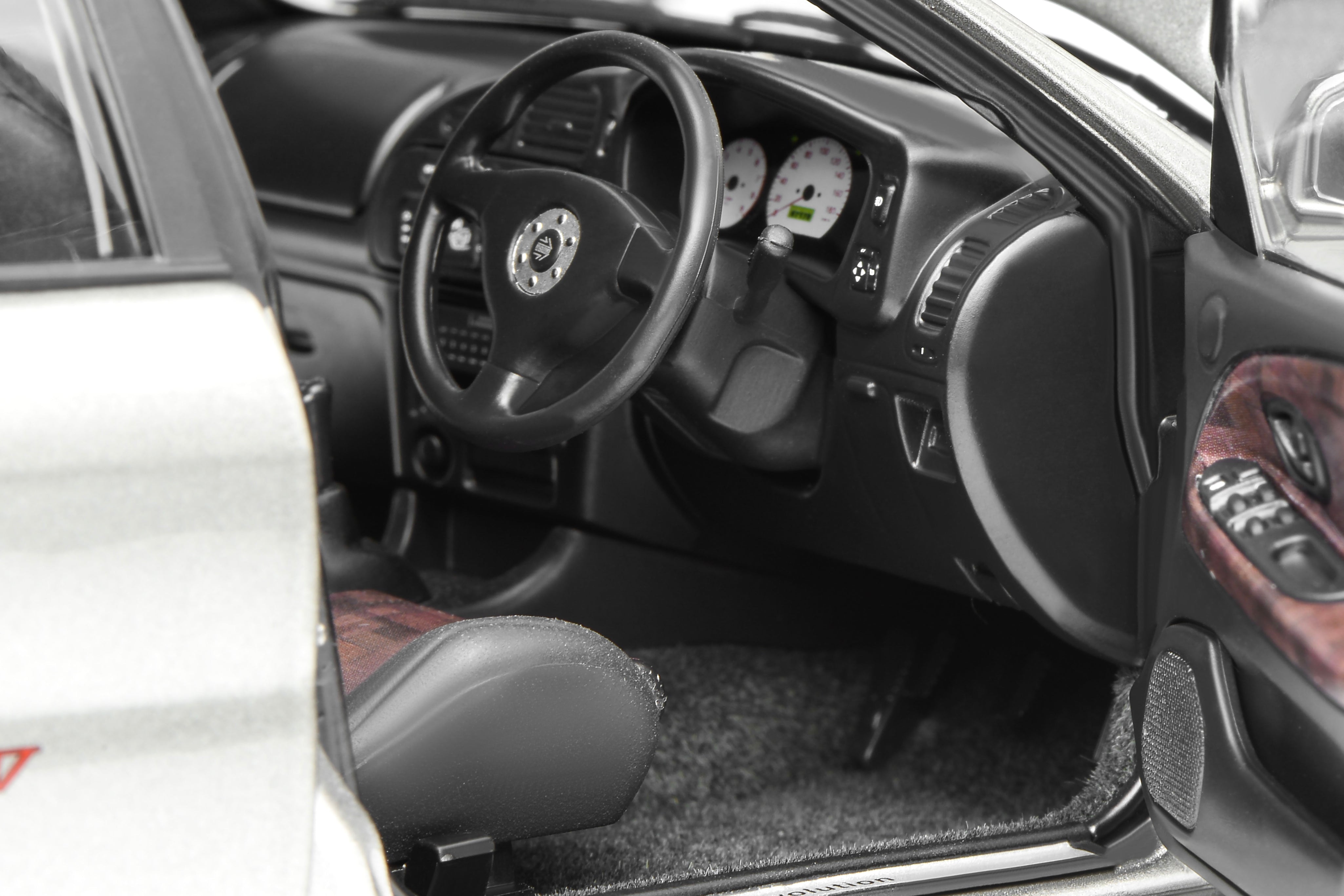 1/18 The Mitsubishi Lancer Evolution IV in Steel Silver - MOTORHELIX