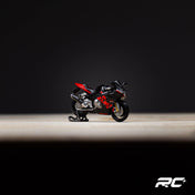 SUZUKI BLACK AND RED MOTORCYCLE DOLL SET RESIN MODEL